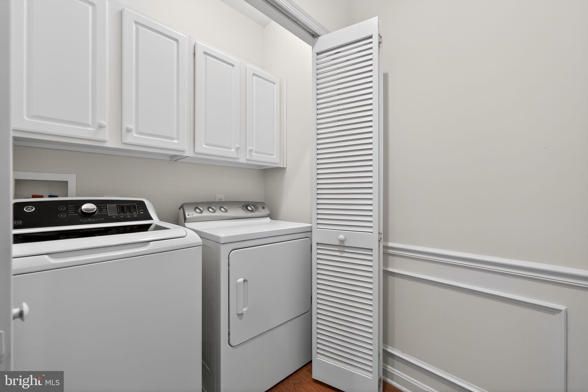 27 Stokes Avenue Voorhees, NJ 08043 - Photo 15 of 39 a utility room with dryer and washer