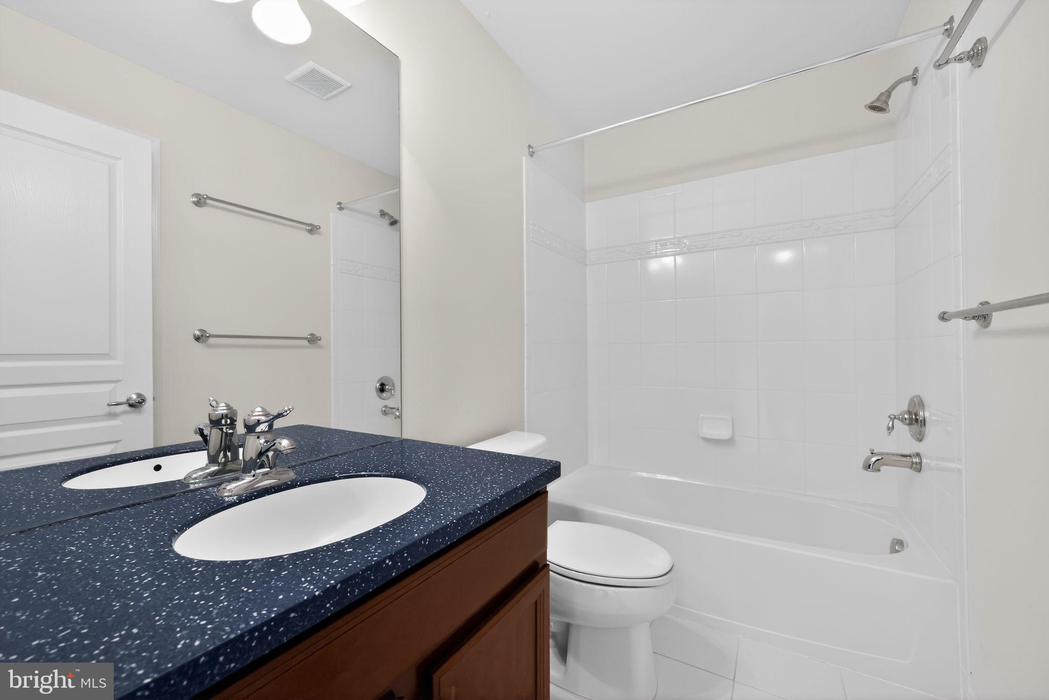 27 Stokes Avenue Voorhees, NJ 08043 - Photo 17 of 39 a bathroom with a granite countertop sink toilet and shower