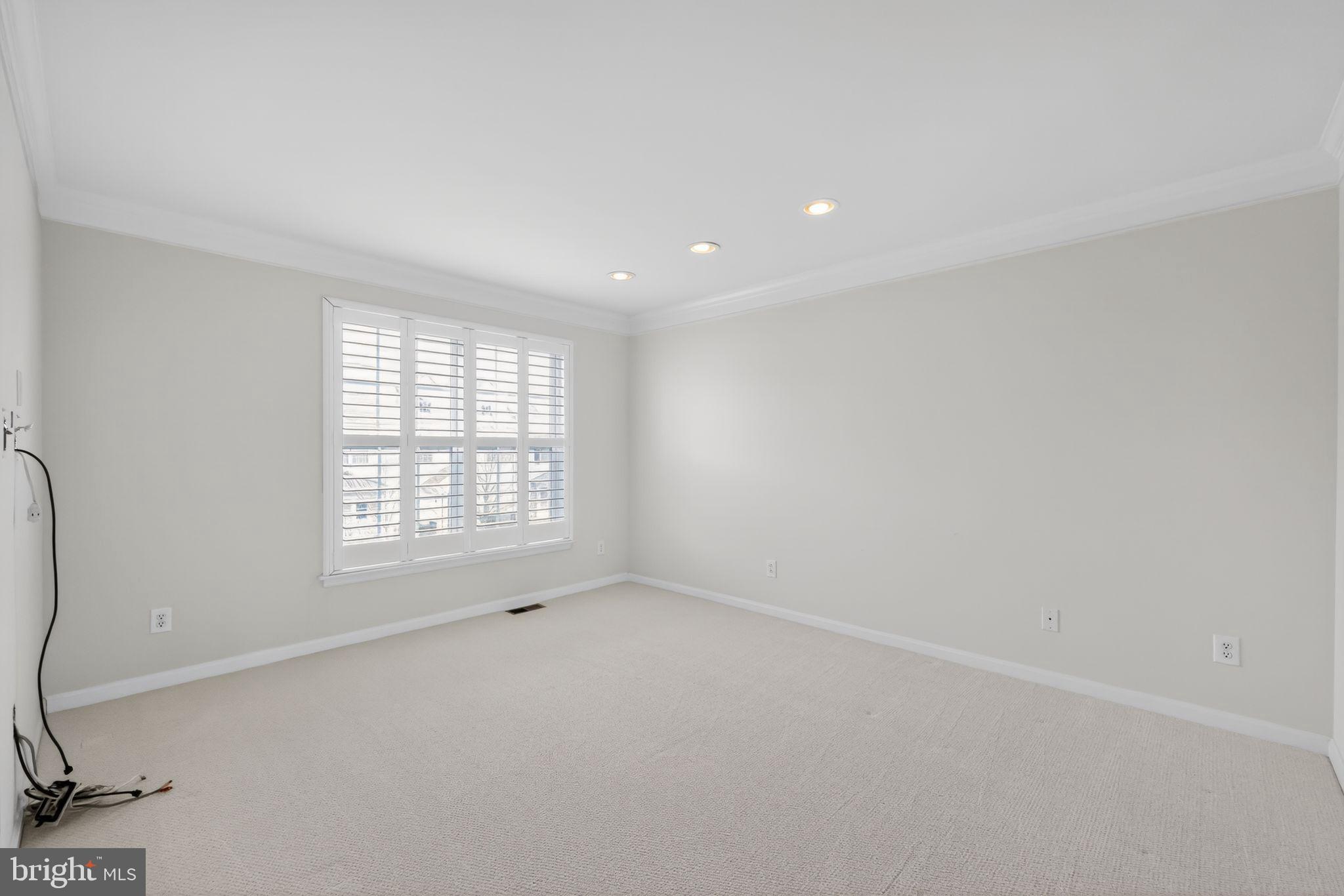 27 Stokes Avenue Voorhees, NJ 08043 - Photo 20 of 39 a view of an empty room with a window