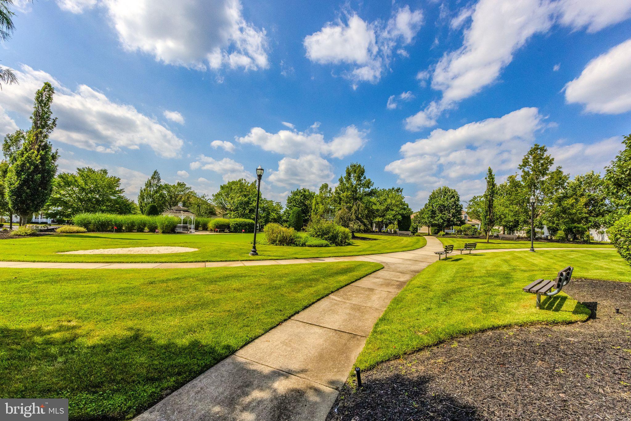 27 Stokes Avenue Voorhees, NJ 08043 - Photo 29 of 39 a view of a swimming pool with a yard