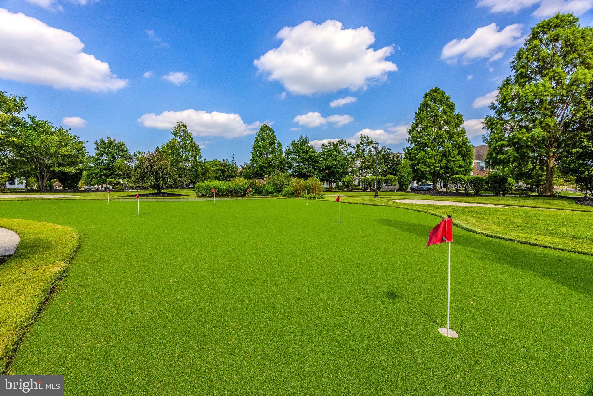 27 Stokes Avenue Voorhees, NJ 08043 - Photo 33 of 39 a view of a golf course with a swimming pool