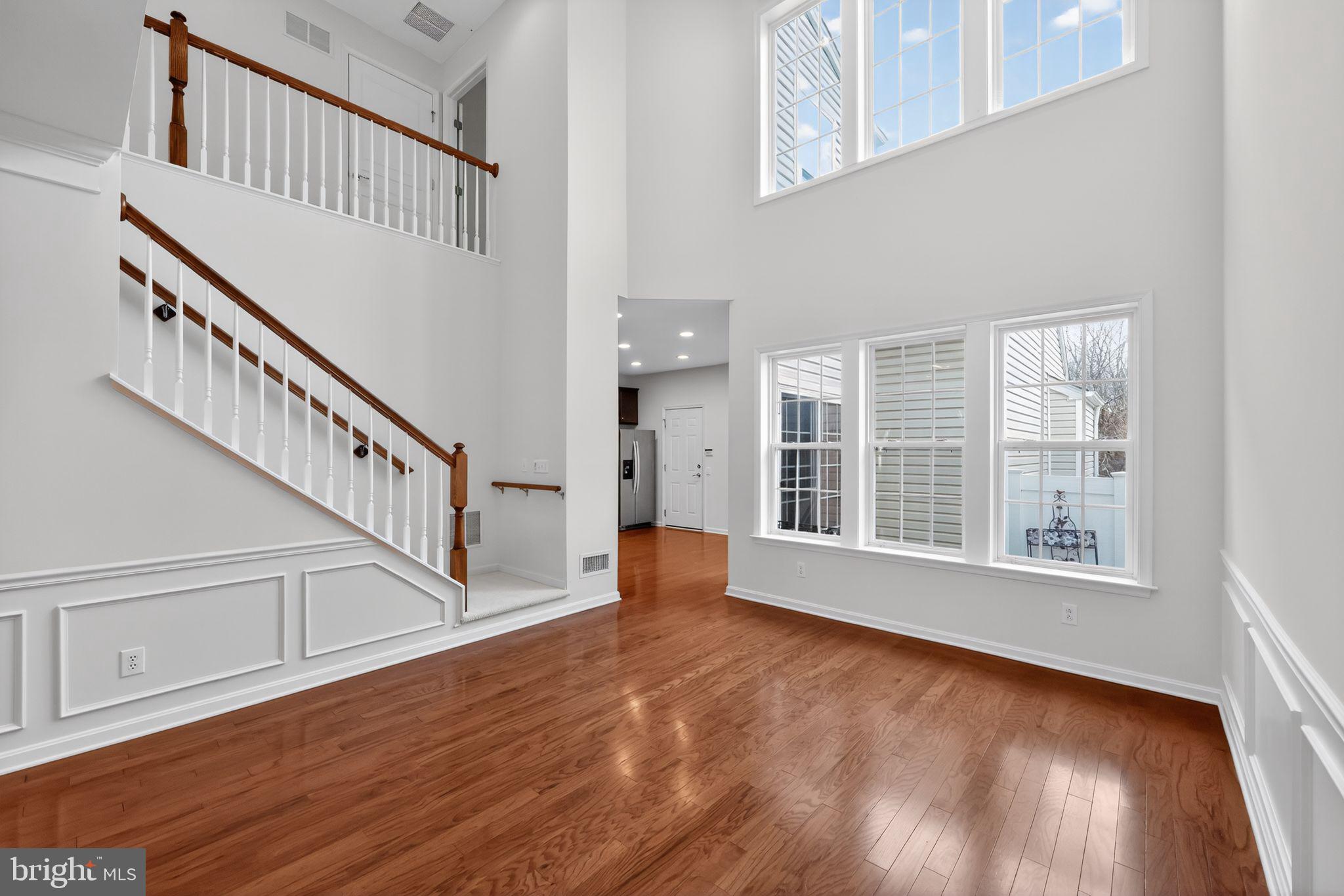 27 Stokes Avenue Voorhees, NJ 08043 - Photo 4 of 39 a view of an entryway with wooden floor