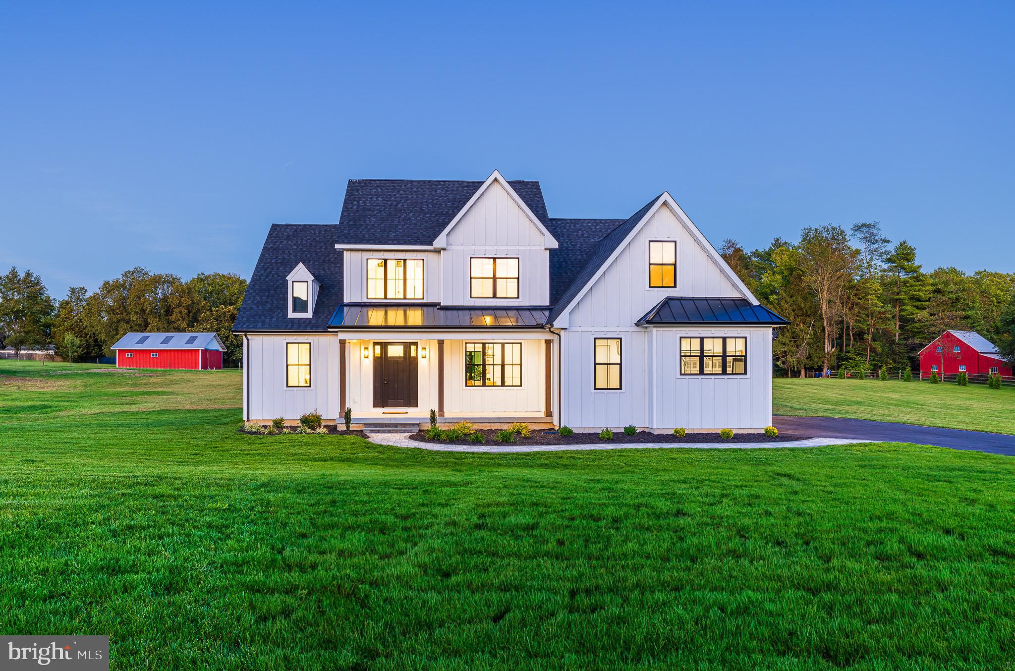 415 Marcus Road Townsend, DE 19734 - Photo 13 of 115 a front view of a house with a yard and trees