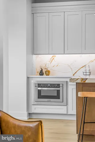 a bedroom with a bed and a shower