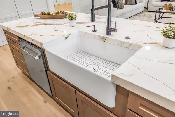a bathroom with a sink a vanity and a bathtub