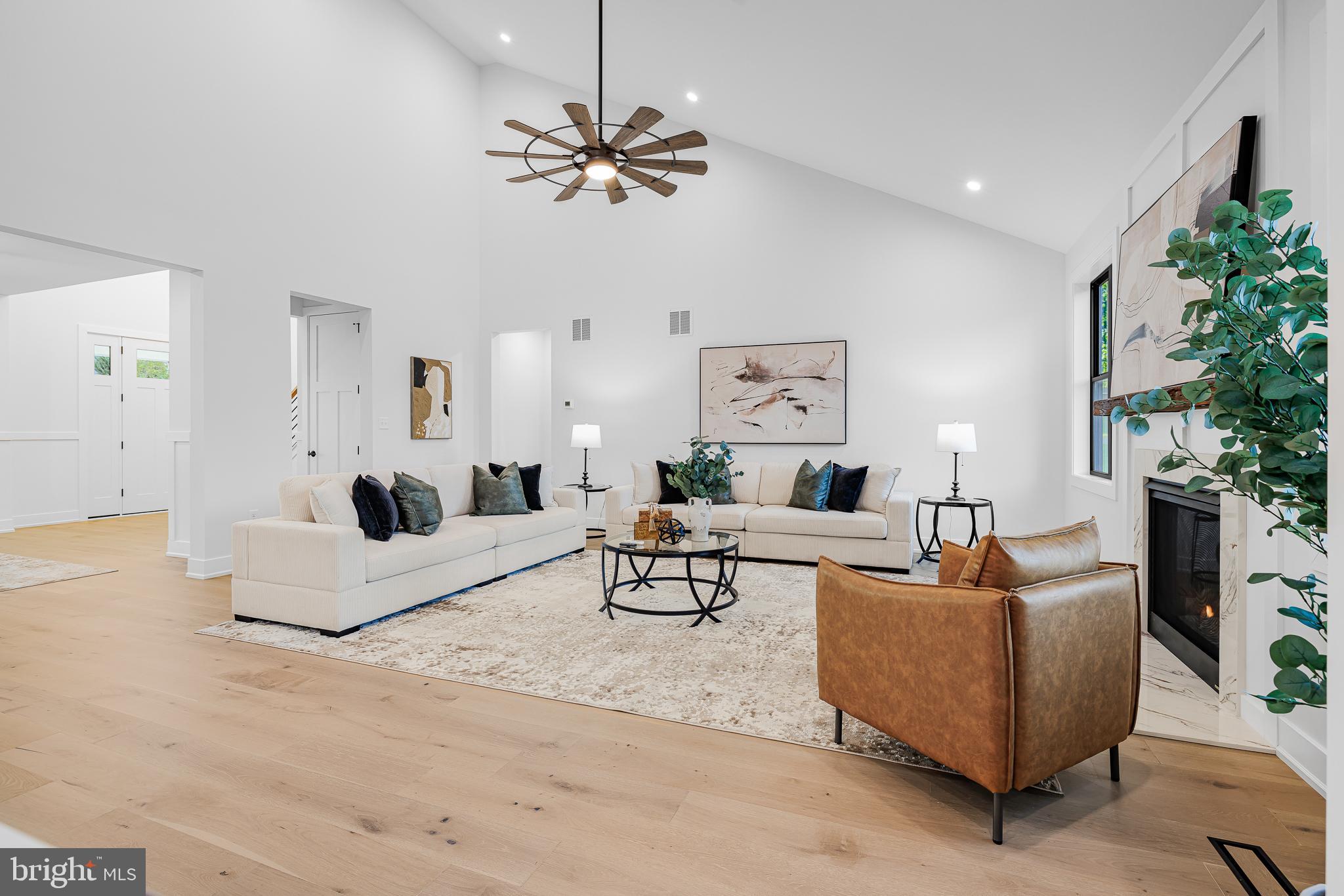 415 Marcus Road Townsend, DE 19734 - Photo 49 of 115 a living room with furniture and a chandelier