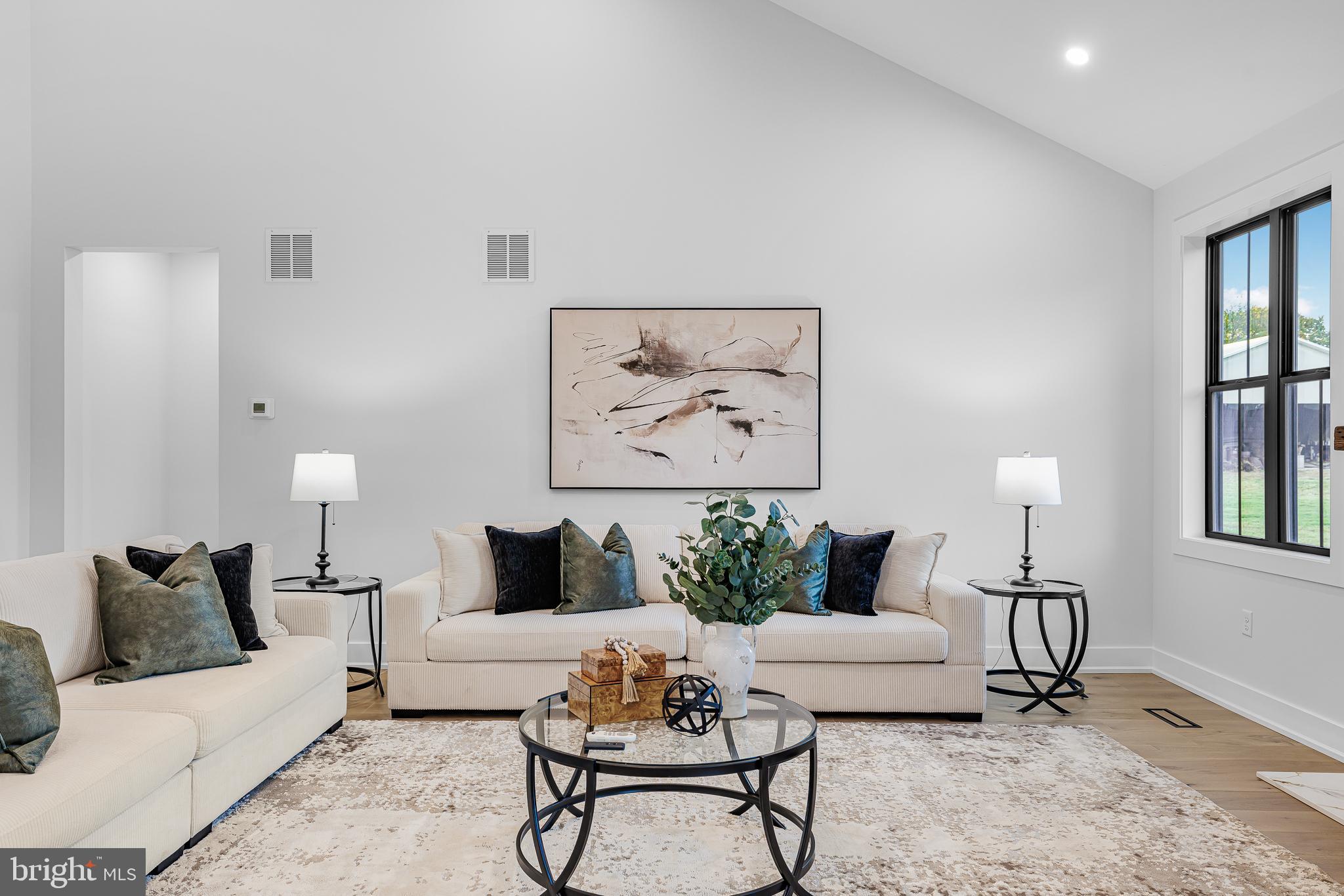 415 Marcus Road Townsend, DE 19734 - Photo 51 of 115 a living room with furniture and a lamp