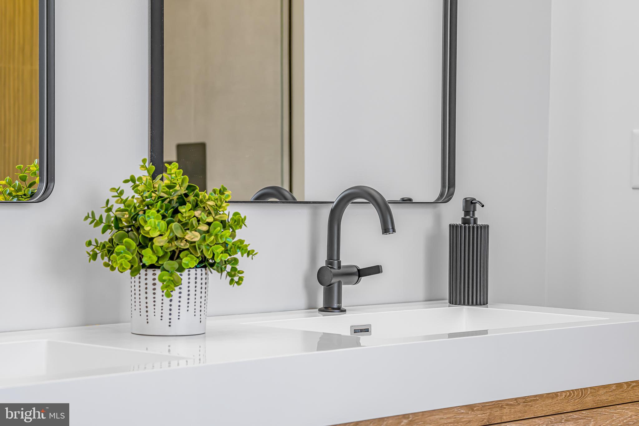 415 Marcus Road Townsend, DE 19734 - Photo 69 of 115 a bathroom with a sink a vanity and a bathtub