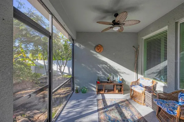 a view of backyard with large windows