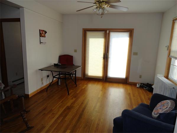 659 Cambridge Street Fall River, MA 02721 - Photo 11 of 18 a living room with furniture and a window