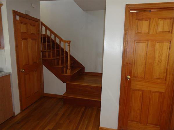 659 Cambridge Street Fall River, MA 02721 - Photo 9 of 18 a view of balcony with wooden floor