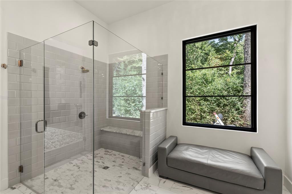 111 Sun Valley Mabank, TX 75147 - Photo 14 of 40 Tiled Shower with Glass Surround and Sitting Area with Plenty of Natural Light
