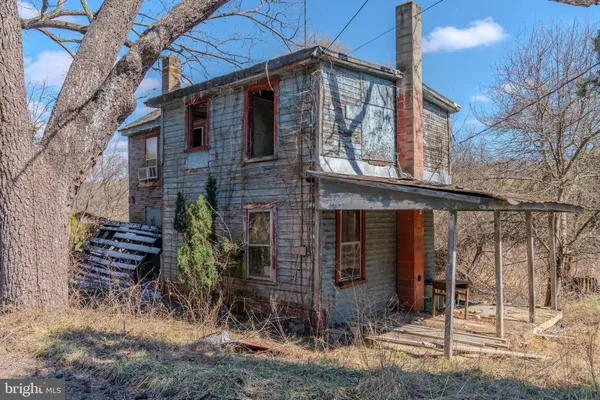 a view of a yard covered with snow