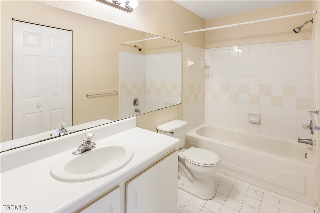 11490 Villa Grand, Unit 224 Fort Myers, FL 33913 - Photo 15 of 30 a bathroom with a sink toilet and shower