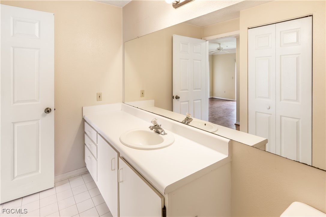 11490 Villa Grand, Unit 224 Fort Myers, FL 33913 - Photo 16 of 30 a bathroom with a sink and a mirror