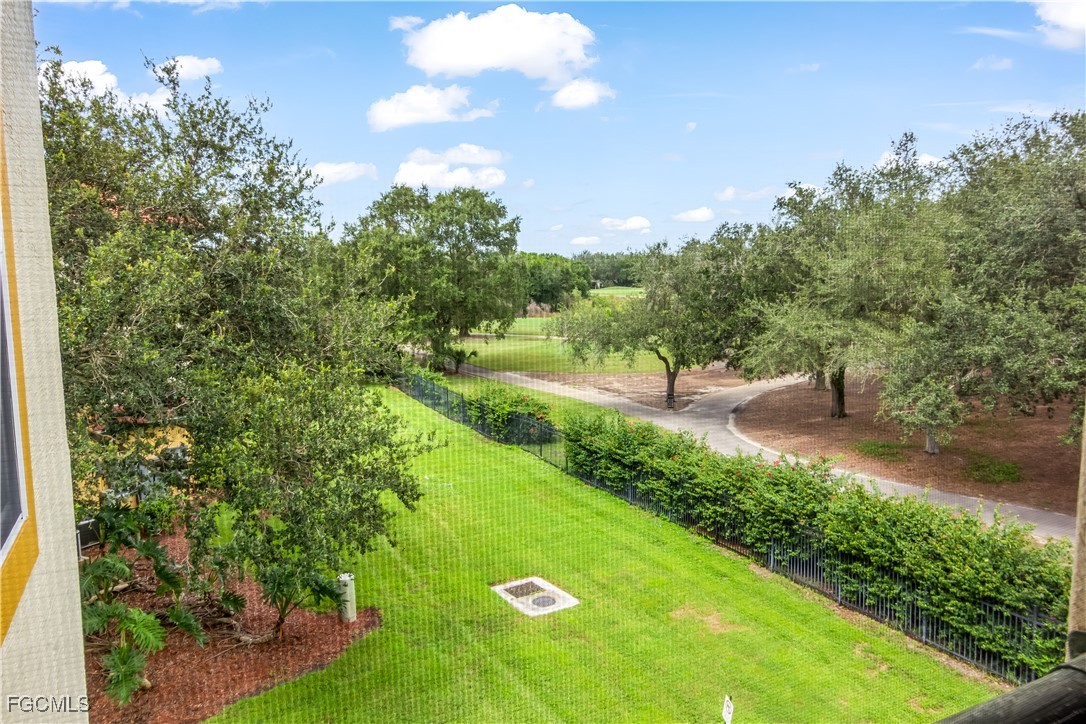 11490 Villa Grand, Unit 224 Fort Myers, FL 33913 - Photo 22 of 30 a view of a garden with an outdoor space