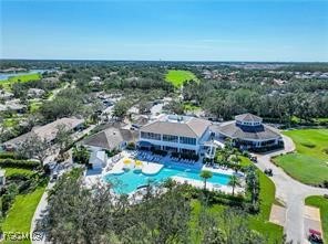 11490 Villa Grand, Unit 224 Fort Myers, FL 33913 - Photo 30 of 30 an aerial view of a house with a garden and lake view