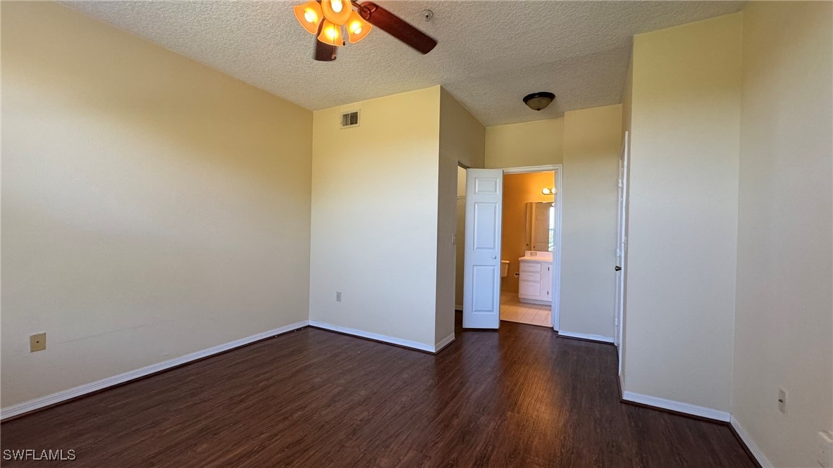 11490 Villa Grand, Unit 224 Fort Myers, FL 33913 - Photo 10 of 30 a view of a hallway with wooden floor