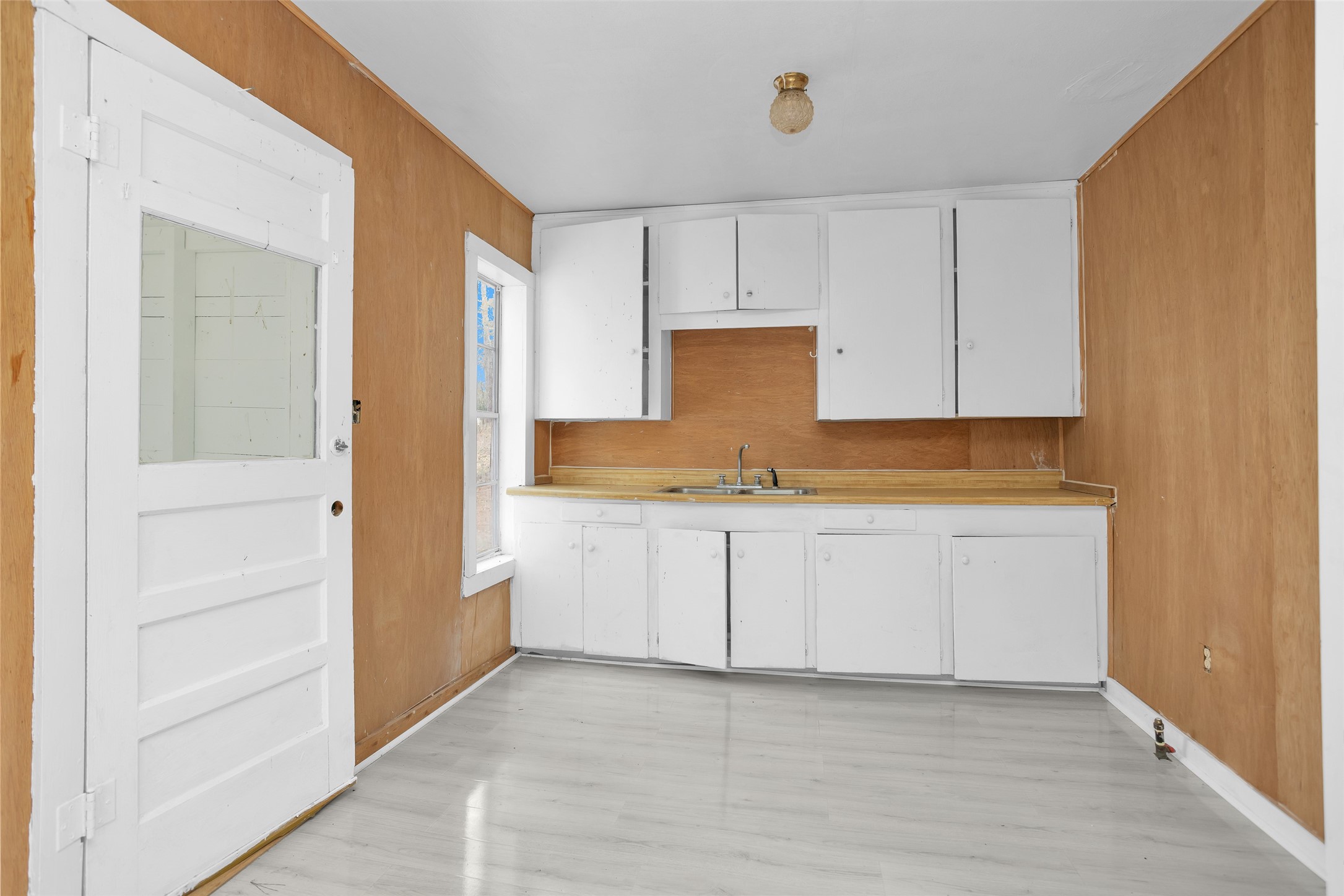 Split B Tall Pine Road Navasota, TX 77868 - Photo 13 of 21 a kitchen with granite countertop white cabinets and white appliances