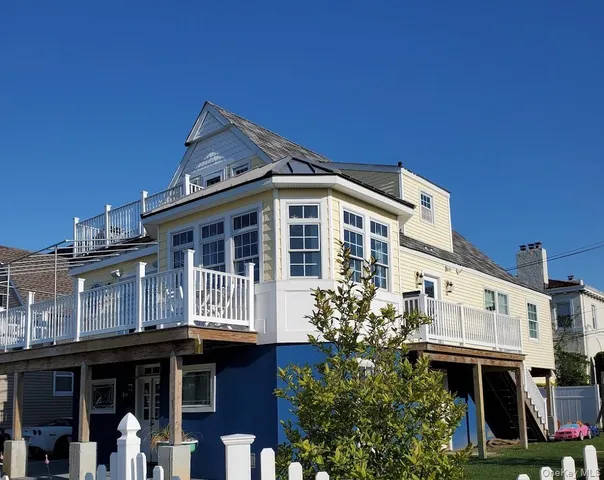 a front view of a building with balcony