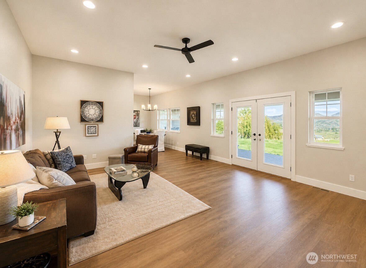 22 Rooster Flats Road Oroville, WA 98844 - Photo 5 of 28 a living room with furniture window and wooden floor