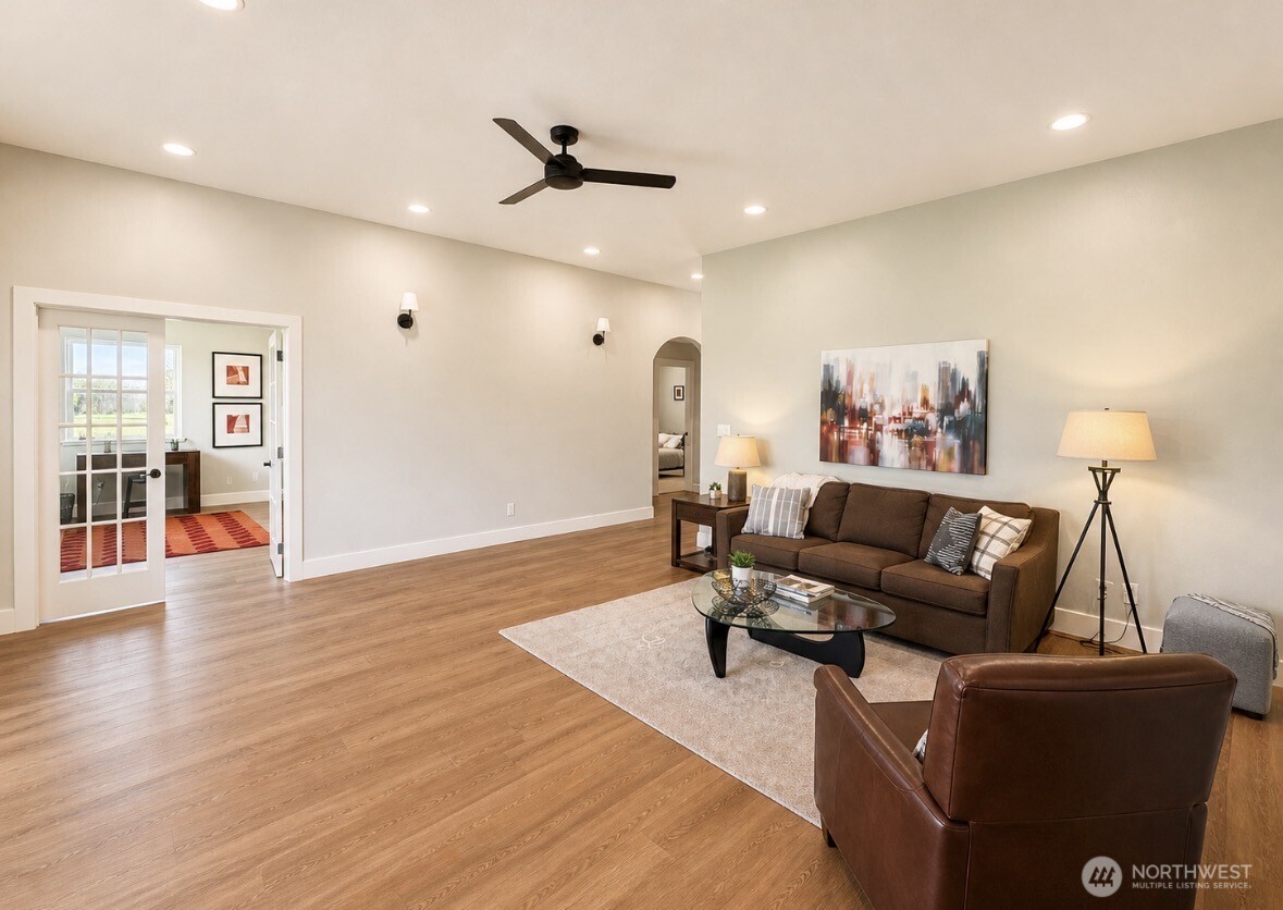 22 Rooster Flats Road Oroville, WA 98844 - Photo 6 of 28 a living room with furniture and a wooden floor
