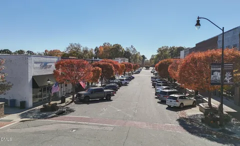 a view of a street with cars