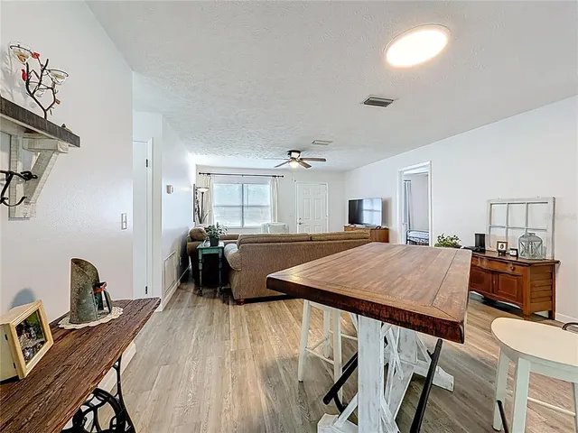 a bed room with a bed furniture and a computer