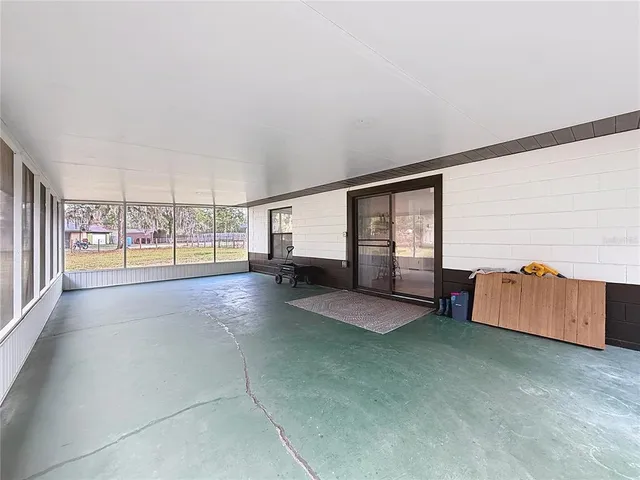 a view of a livingroom with furniture and windows