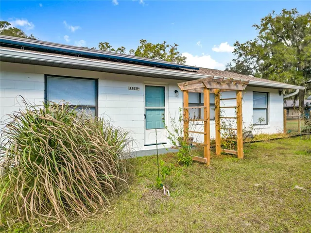 a house view with a outdoor space