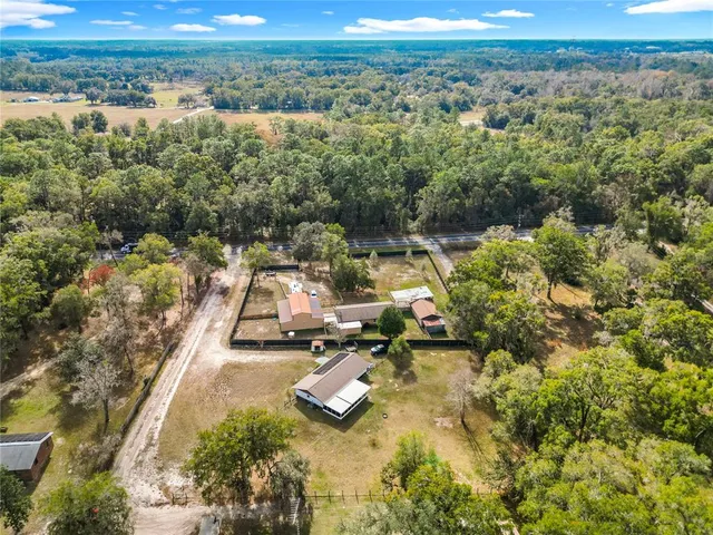 a view of a yard with an outdoor space
