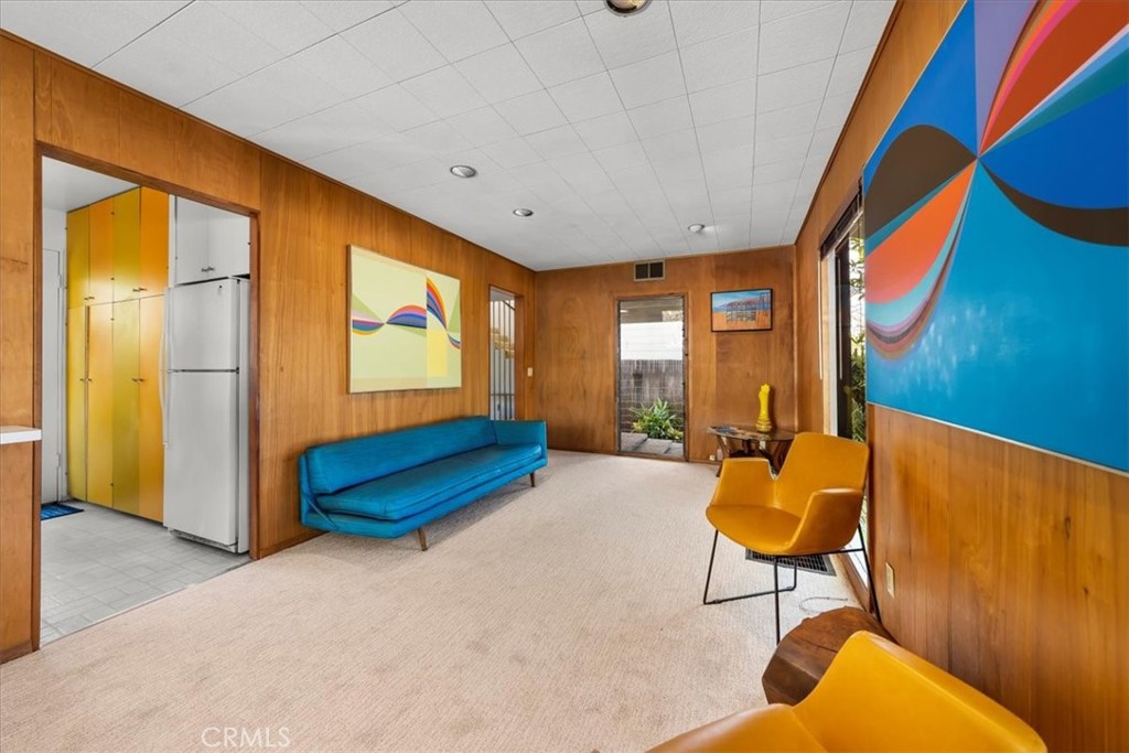 418 Sycamore Road Santa Monica, CA 90402 - Photo 14 of 43 a living room with furniture and a large window