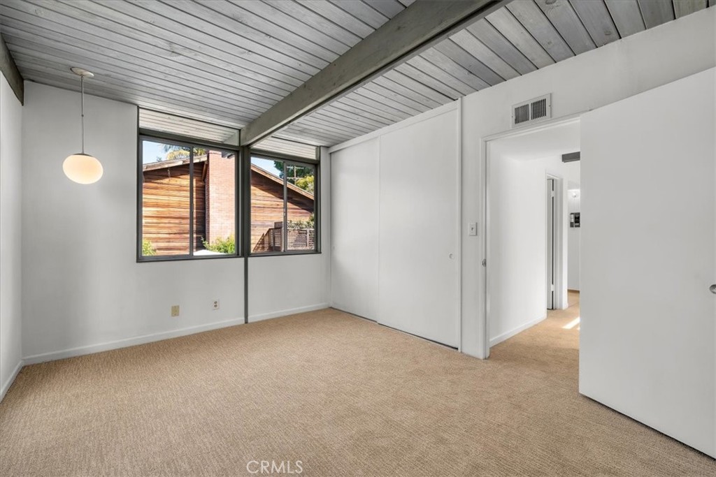 418 Sycamore Road Santa Monica, CA 90402 - Photo 25 of 43 an empty room with windows