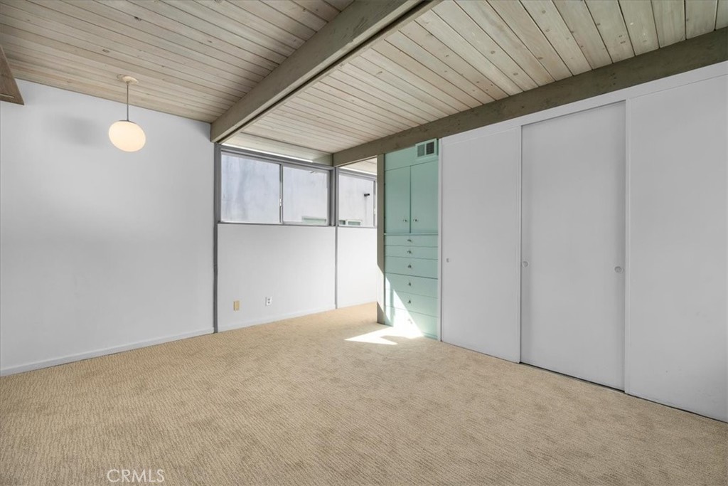 418 Sycamore Road Santa Monica, CA 90402 - Photo 28 of 43 a view of empty room with a fireplace
