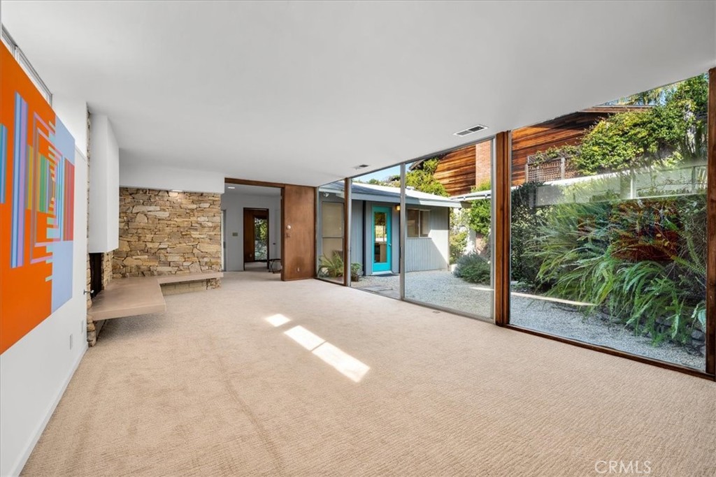 418 Sycamore Road Santa Monica, CA 90402 - Photo 9 of 43 a view of a house with porch and garden