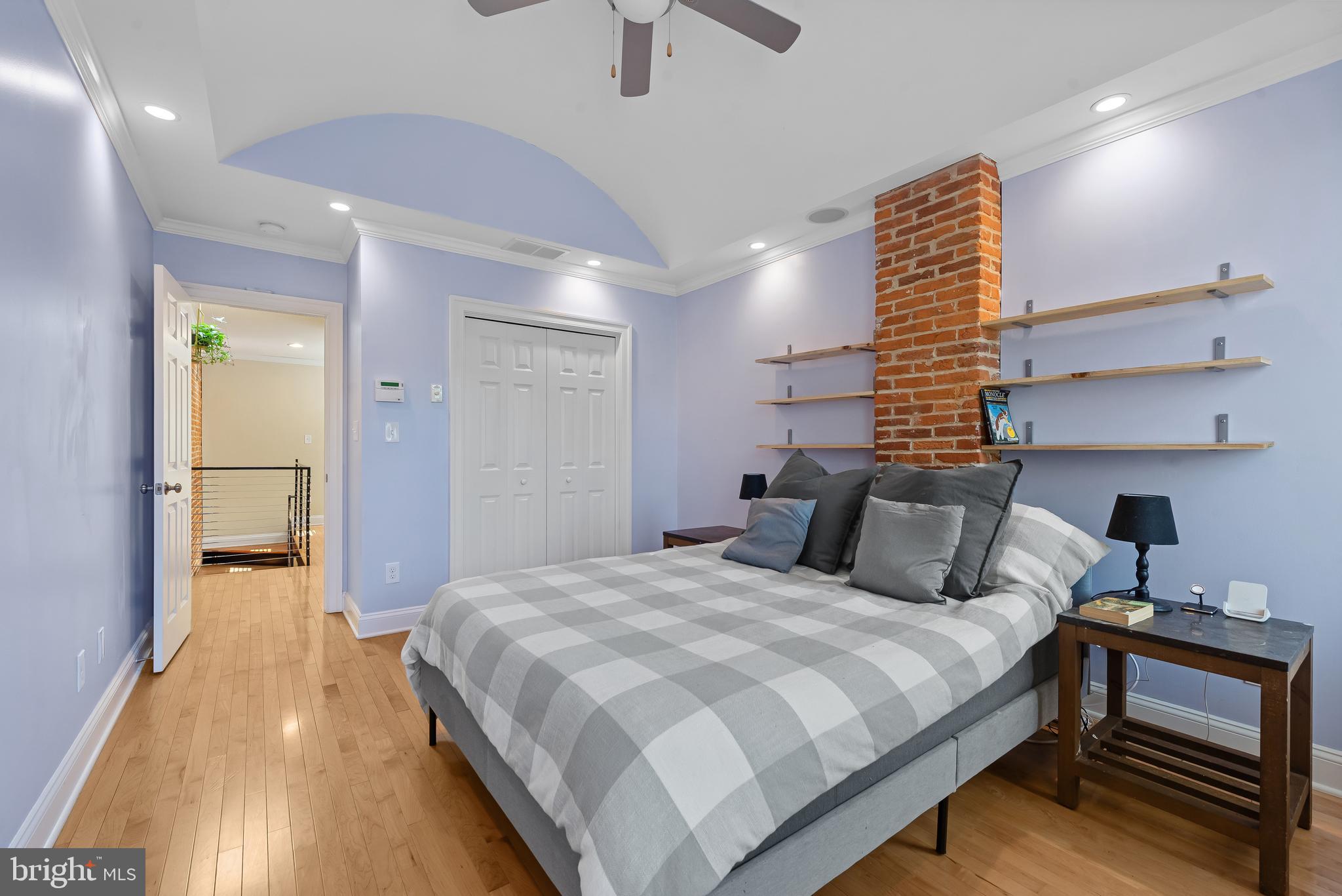 3006 Dillon Street Baltimore, MD 21224 - Photo 15 of 27 a bedroom with bed and window