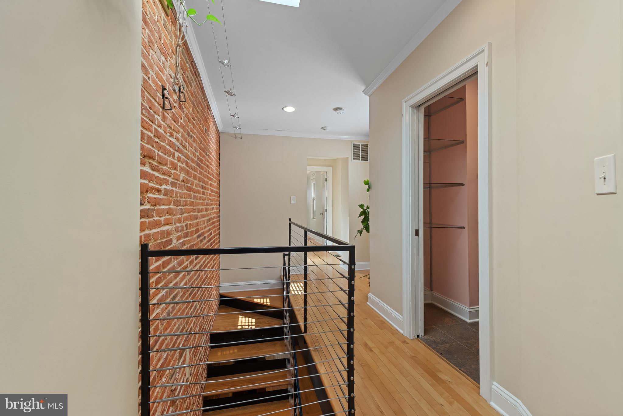 3006 Dillon Street Baltimore, MD 21224 - Photo 19 of 27 a view of entryway with wooden floor