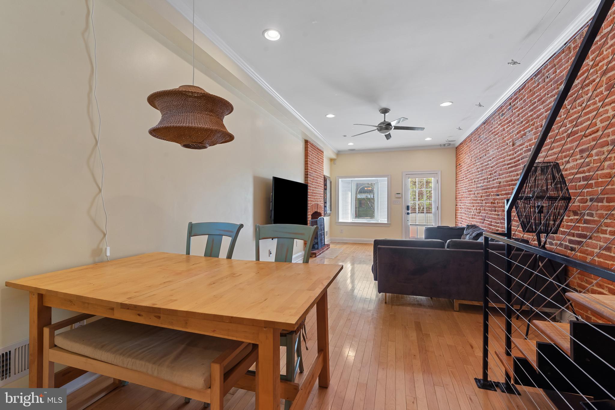3006 Dillon Street Baltimore, MD 21224 - Photo 6 of 27 a view of a livingroom with furniture and a flat screen tv