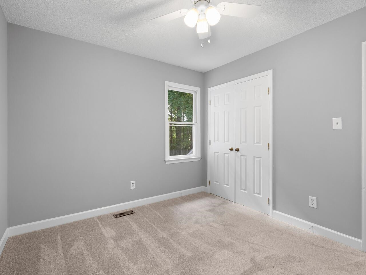 3608 Iron Sight Court Raleigh, NC 27616 - Photo 13 of 36 a view of an empty room with a window