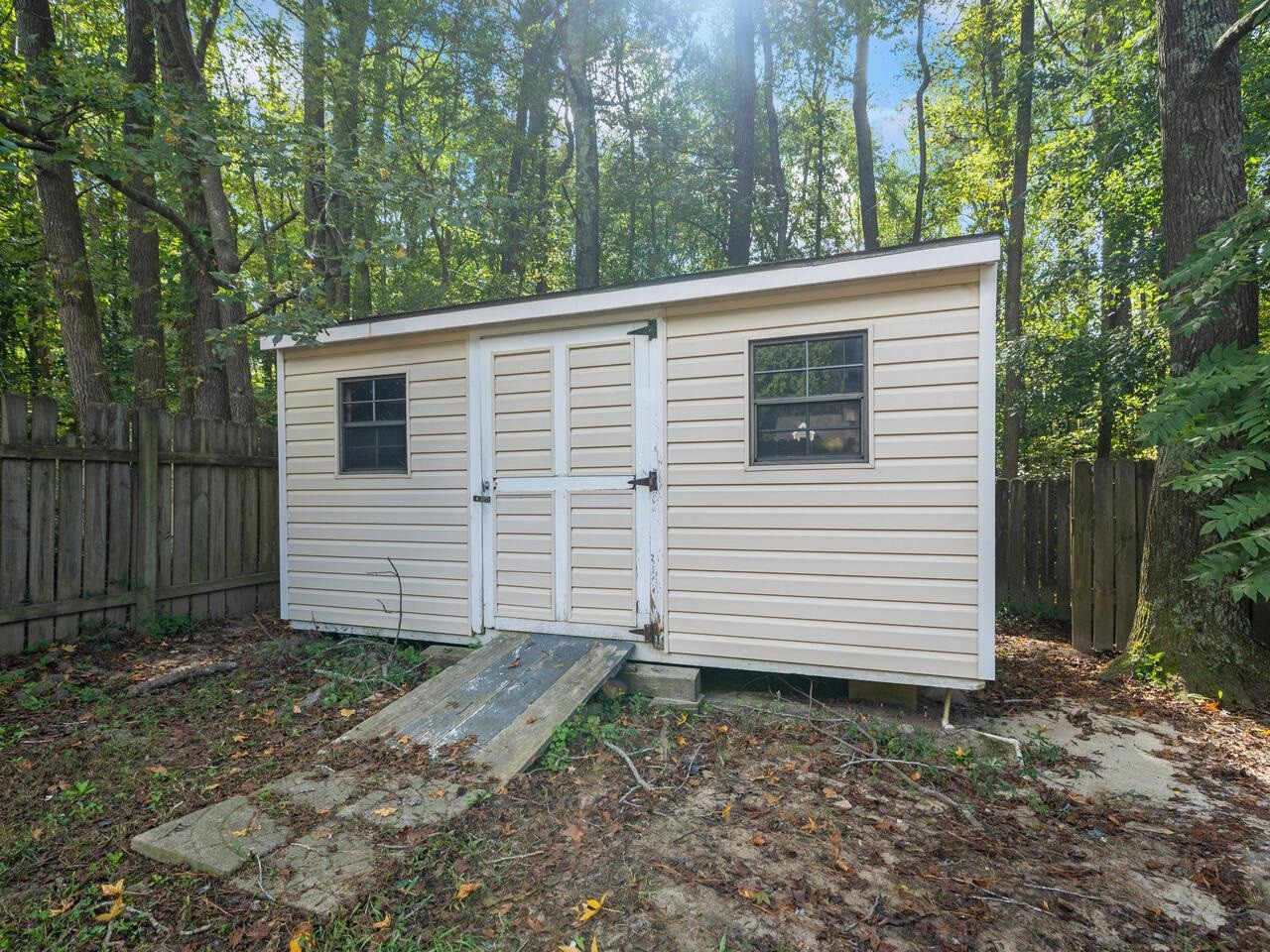 3608 Iron Sight Court Raleigh, NC 27616 - Photo 28 of 36 a view of a house with a yard