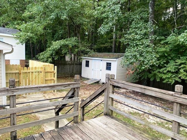 3608 Iron Sight Court Raleigh, NC 27616 - Photo 29 of 36 a view of house with backyard and seating area