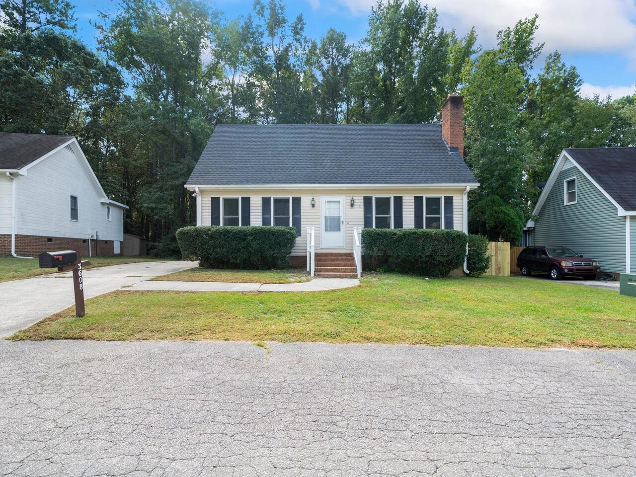 3608 Iron Sight Court Raleigh, NC 27616 - Photo 35 of 36 a front view of a house with a yard and garage