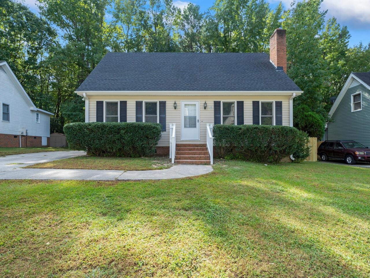 3608 Iron Sight Court Raleigh, NC 27616 - Photo 36 of 36 a front view of a house with a yard and trees