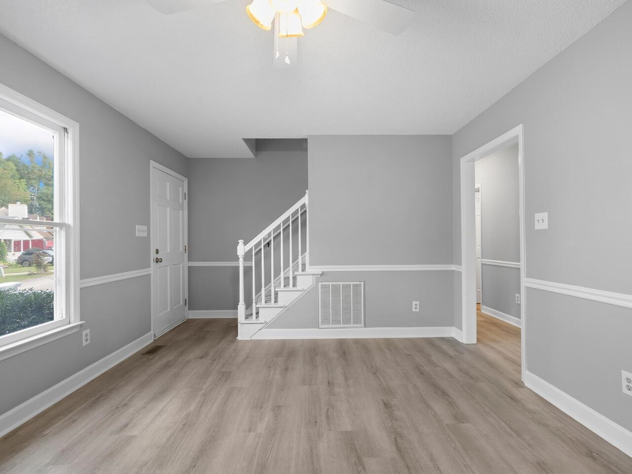 3608 Iron Sight Court Raleigh, NC 27616 - Photo 6 of 36 a view of entryway with wooden floor