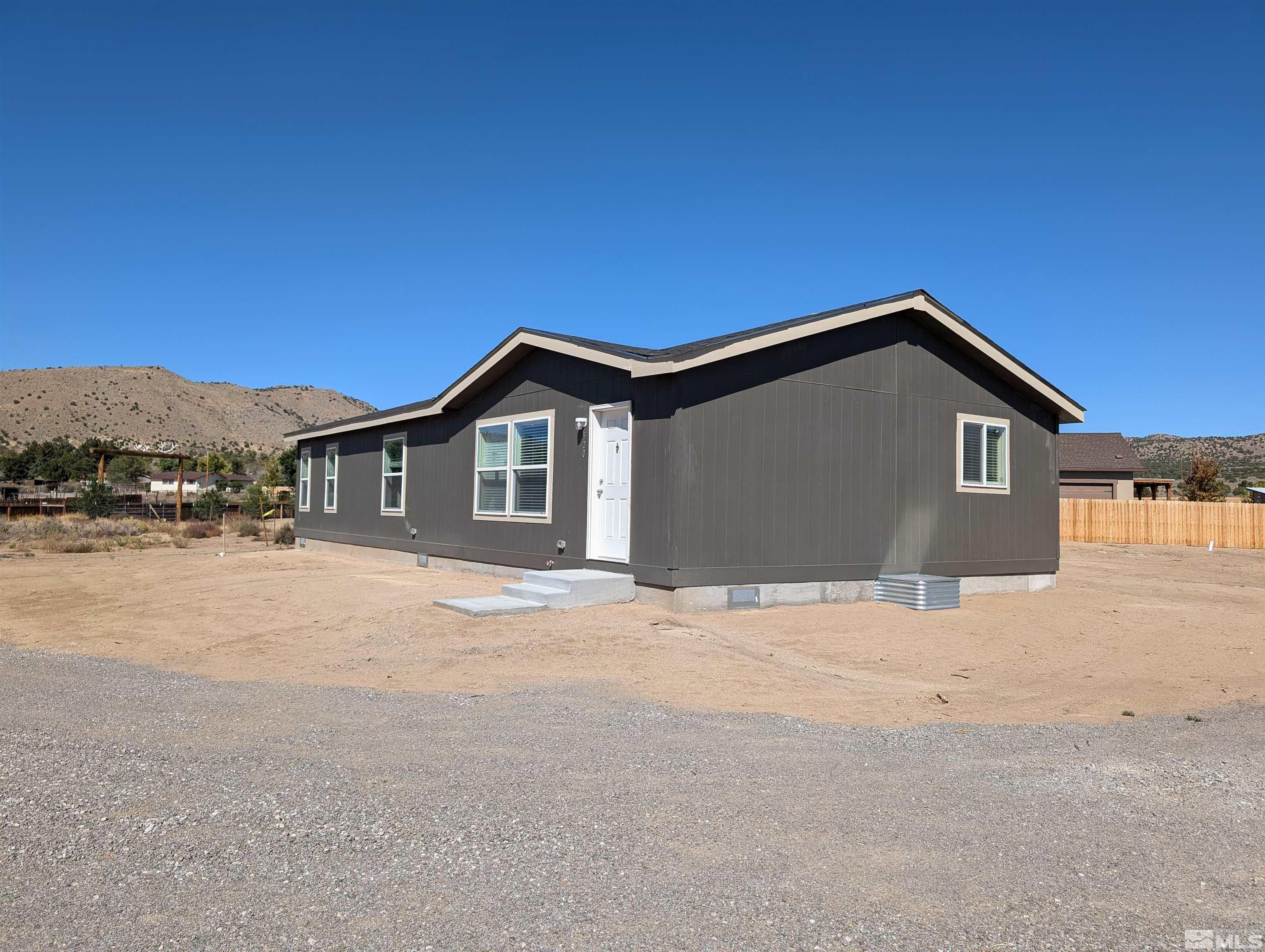 520 Matterhorn Boulevard Reno, NV 89506 - Photo 4 of 11 a front view of house with yard and green space