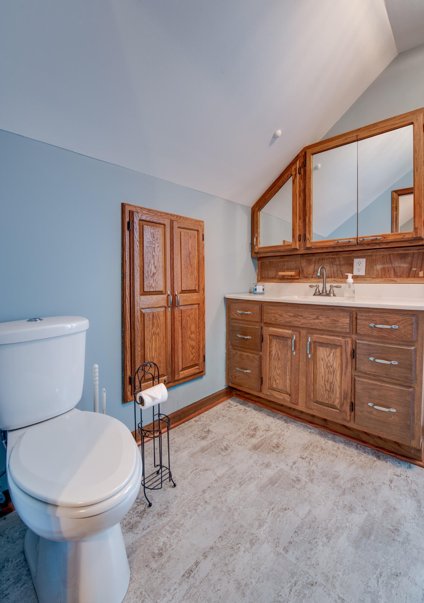 516 East North Street Crown Point, IN 46307 - Photo 14 of 20 a bathroom with a toilet sink and mirror