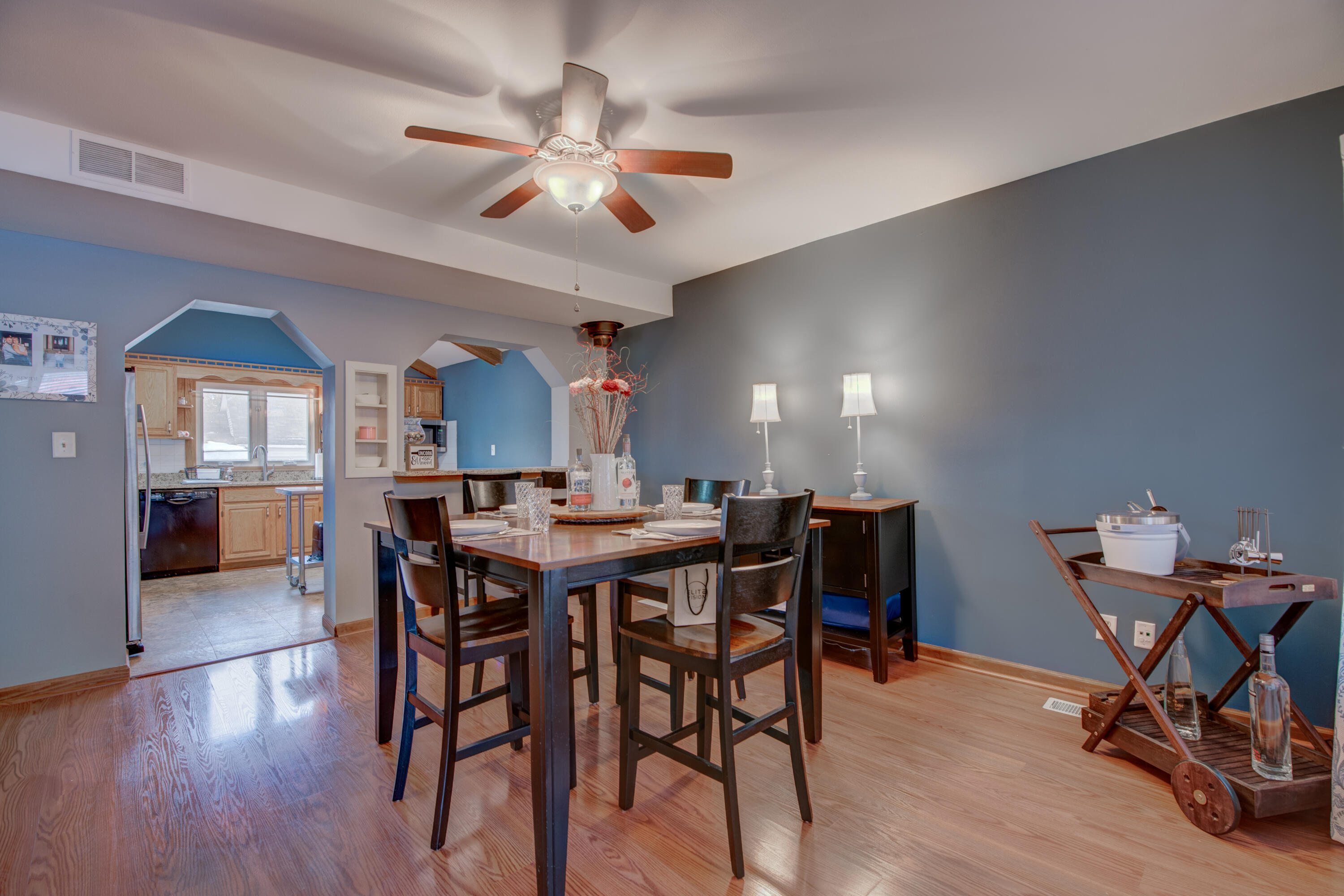 516 East North Street Crown Point, IN 46307 - Photo 8 of 20 a view of a dining room with furniture and wooden floor
