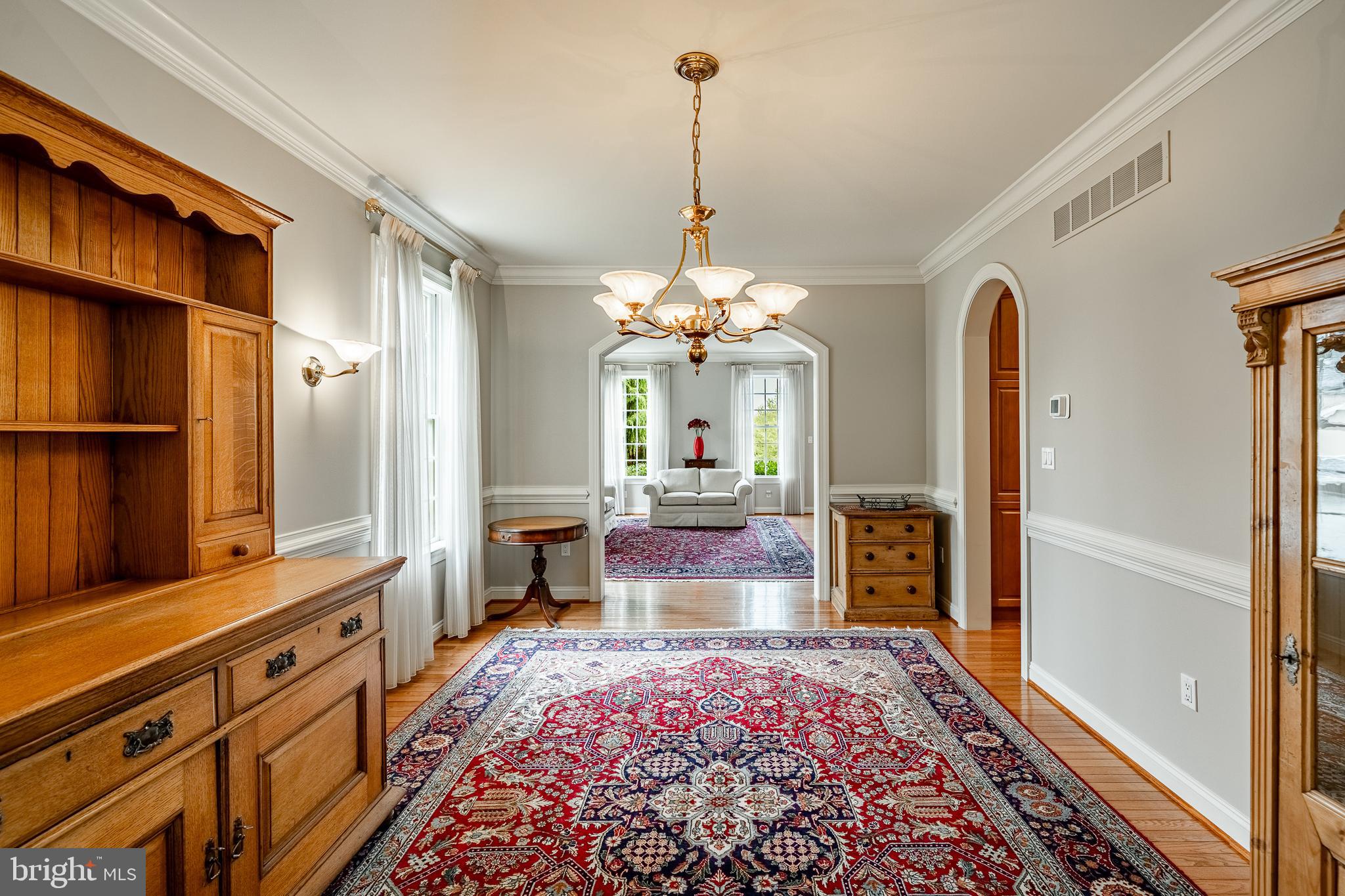 37 Ruth Circle Malvern, PA 19355 - Photo 13 of 63 a spacious bedroom with a bed and a chandelier
