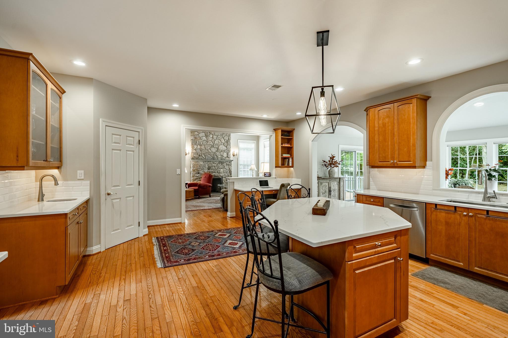 37 Ruth Circle Malvern, PA 19355 - Photo 14 of 63 a kitchen with a table chairs sink and wooden floor