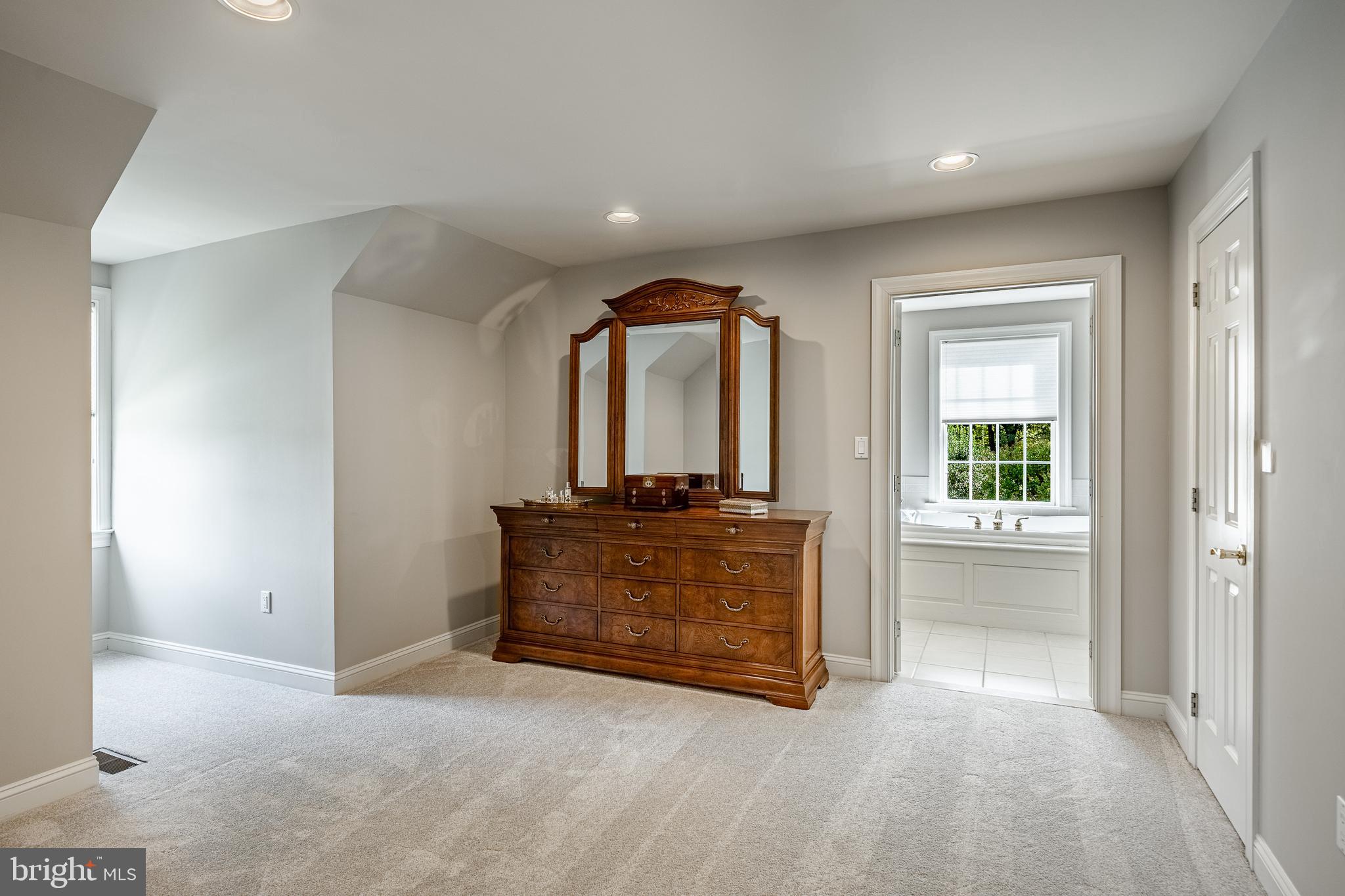 37 Ruth Circle Malvern, PA 19355 - Photo 33 of 63 an empty room with a mirror and windows